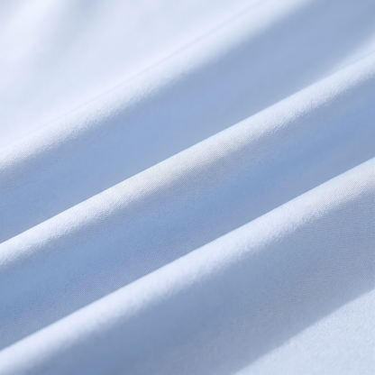 Close-up of Covelle ice-silk fabric weave with cool sheen, light blue