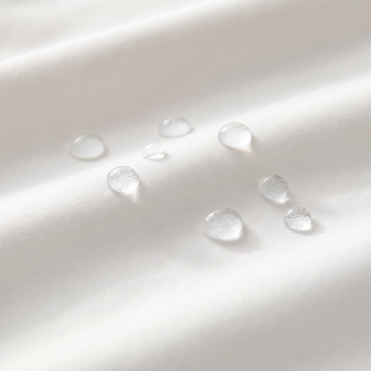 Water droplets beading on the Covelle pillow protector fabric