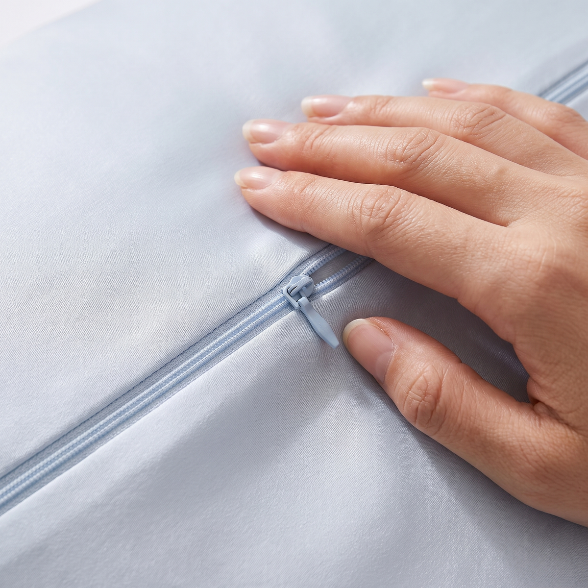 Close-up of the Covelle ice-silk pillow cover and zipper