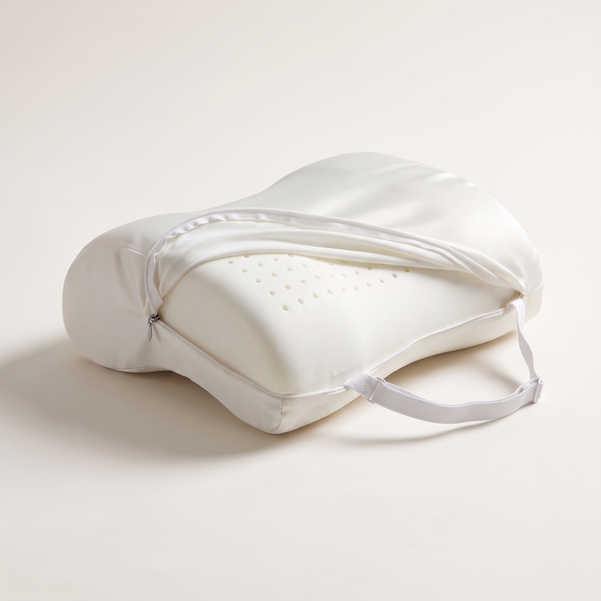 Covelle knee pillow with cover unzipped showing ventilated memory foam